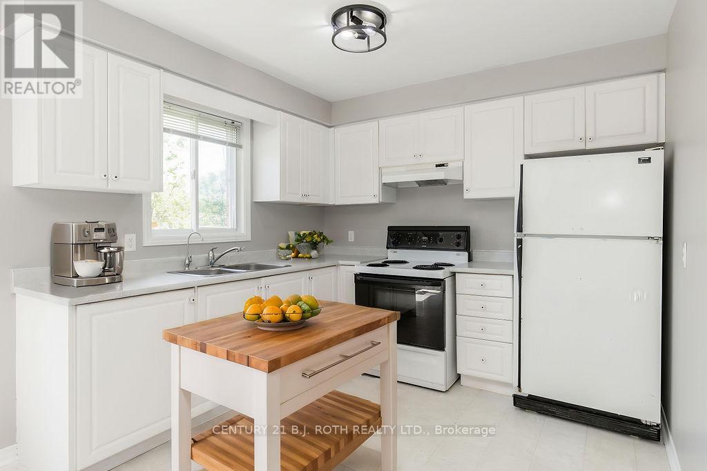 153 Livingstone Street W, Barrie, ON - Indoor Photo Showing Kitchen With Double Sink