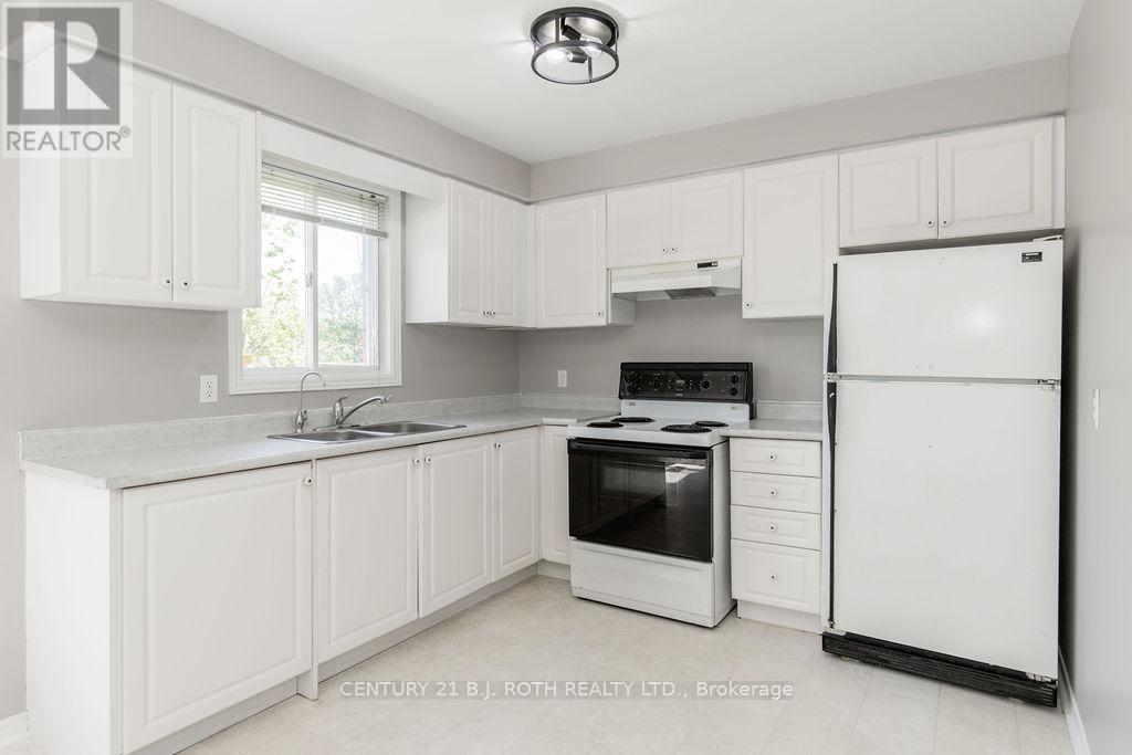 153 Livingstone Street W, Barrie, ON - Indoor Photo Showing Kitchen With Double Sink