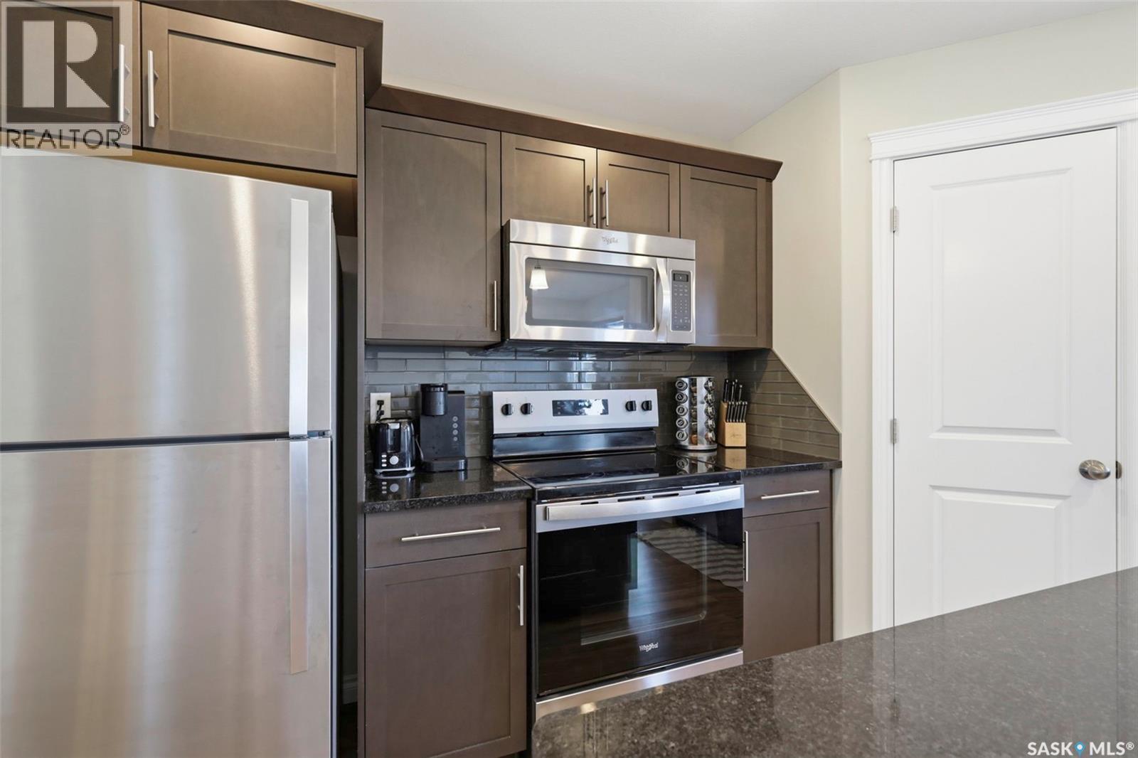 414 Maningas Bend, Saskatoon, SK - Indoor Photo Showing Kitchen