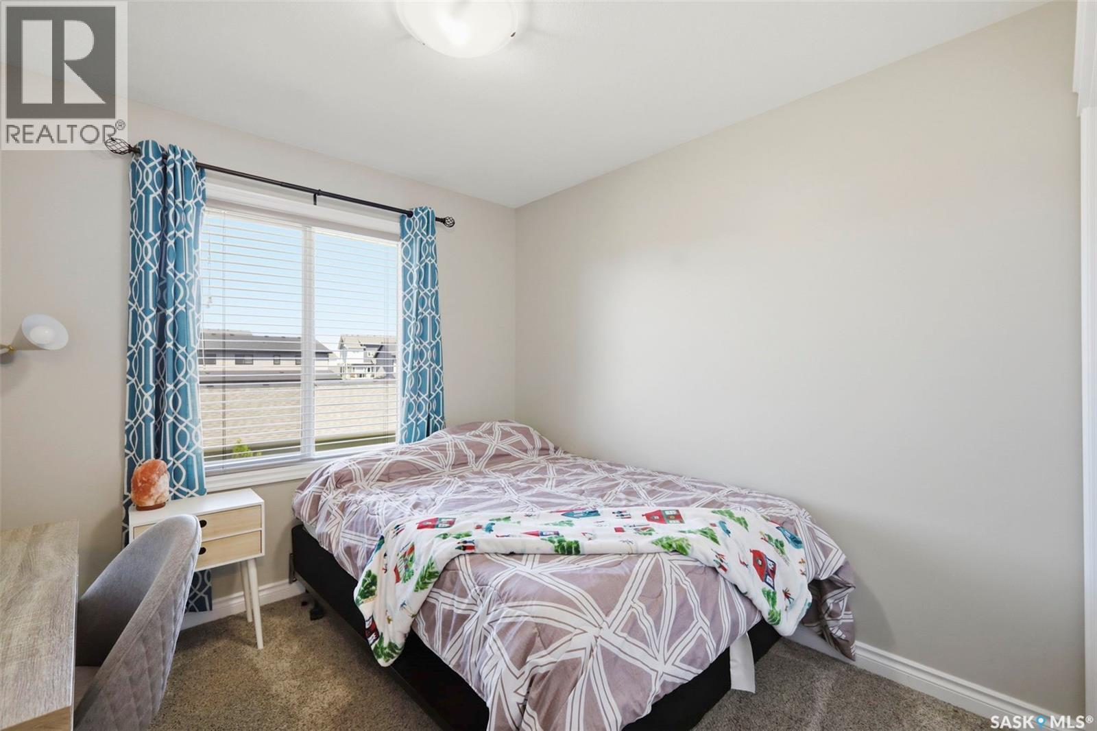 414 Maningas Bend, Saskatoon, SK - Indoor Photo Showing Bedroom