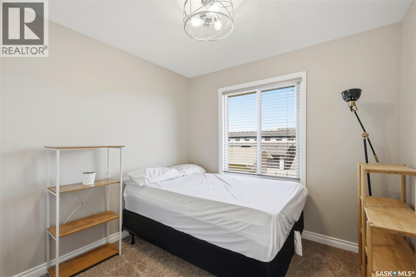 414 Maningas Bend, Saskatoon, SK - Indoor Photo Showing Bedroom