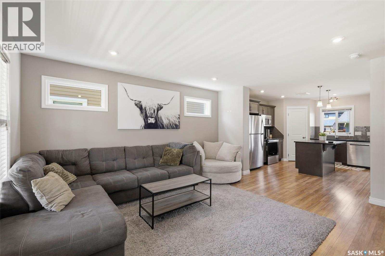 414 Maningas Bend, Saskatoon, SK - Indoor Photo Showing Living Room