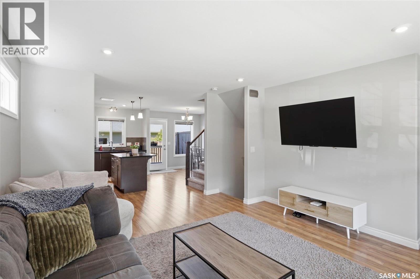 414 Maningas Bend, Saskatoon, SK - Indoor Photo Showing Living Room