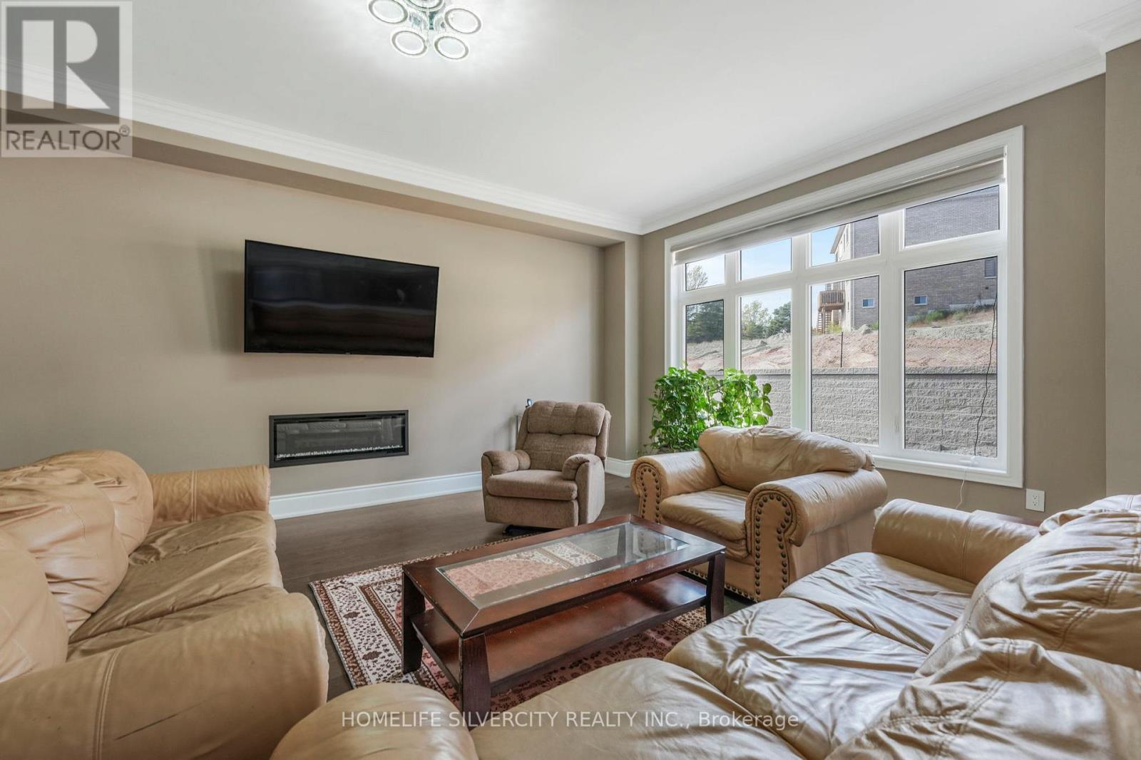 85 James Walker Avenue, Caledon, ON - Indoor Photo Showing Living Room With Fireplace