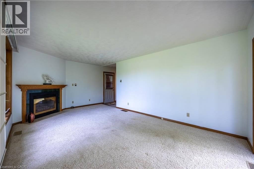 1712 Vittoria Road, Vittoria, ON - Indoor With Fireplace
