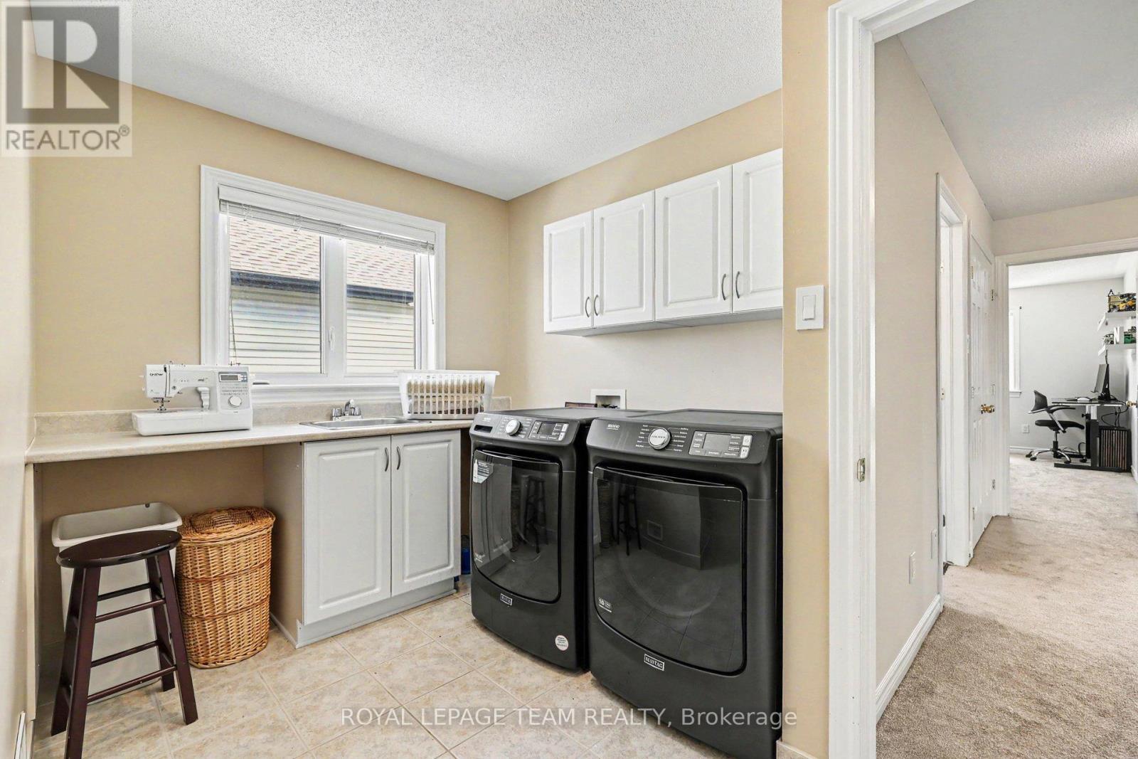 Hand upstairs laundry area - 65 Osprey Crescent, Ottawa, ON