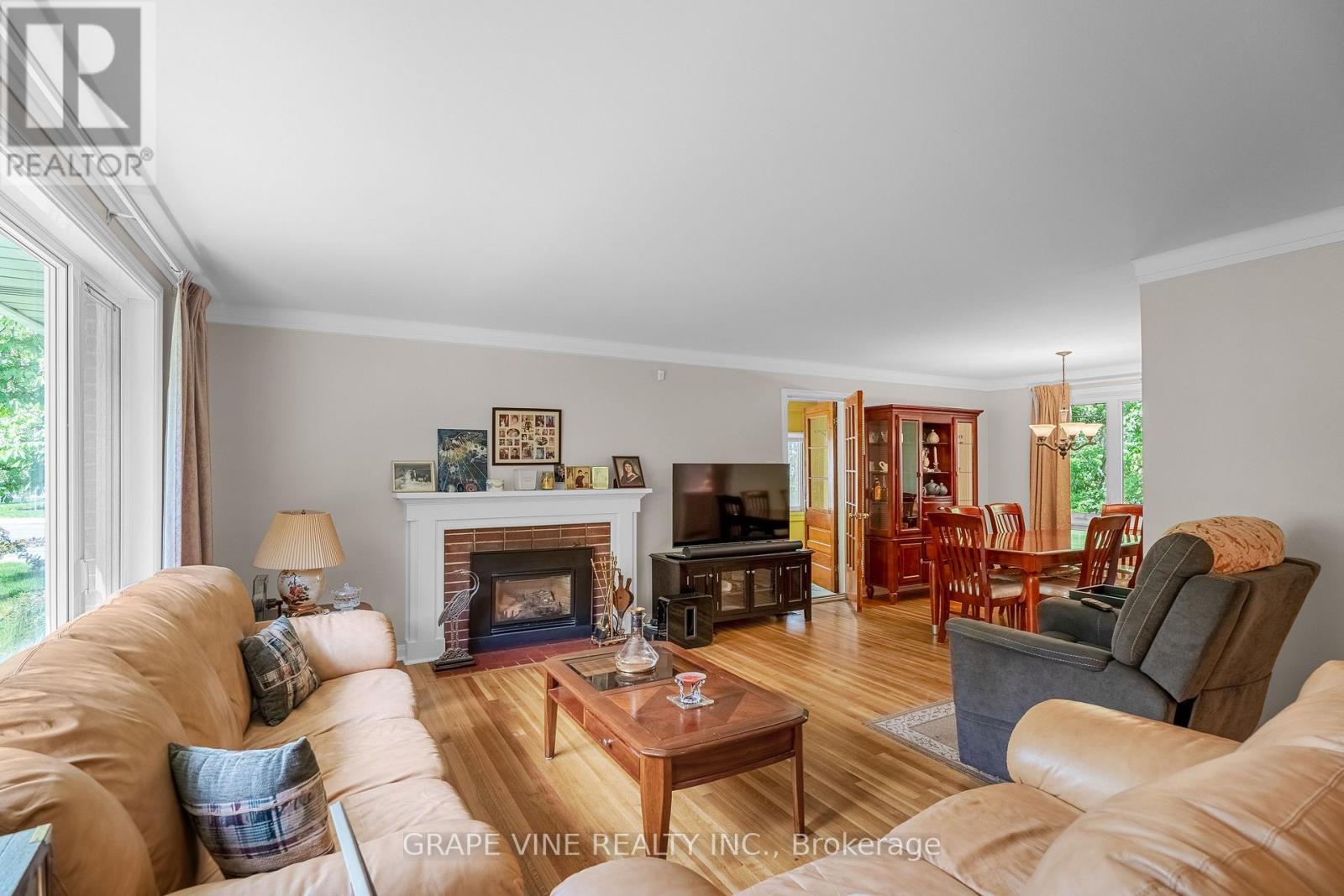 2201 Braeside Avenue, Ottawa, ON - Indoor Photo Showing Living Room With Fireplace
