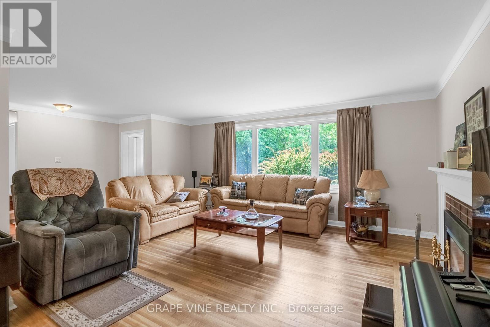 2201 Braeside Avenue, Ottawa, ON - Indoor Photo Showing Living Room With Fireplace