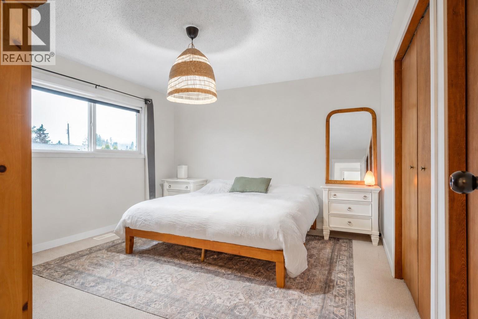Main Home - Primary Bedroom - 302 Bass Avenue, Enderby, BC - Indoor Photo Showing Bedroom