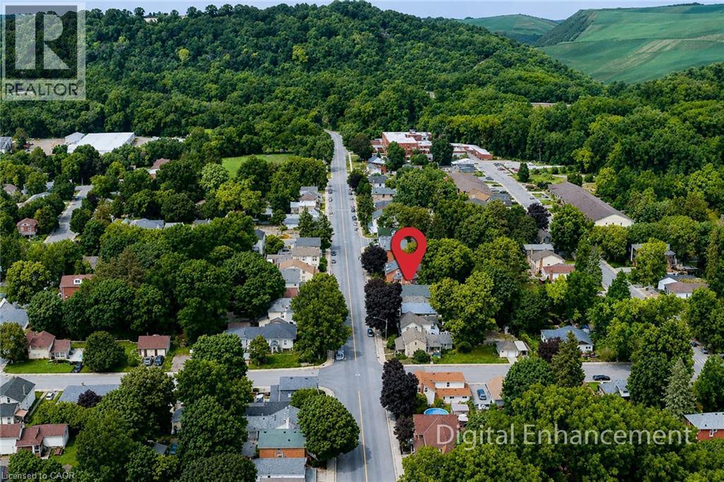 Aerial perspective of a residential neighborhood featuring established homes and mature tree-lined streets - 319 King Street W, Dundas, ON - Outdoor With View