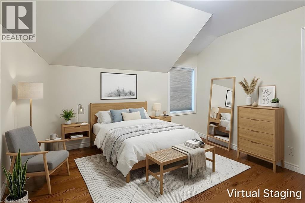 Hardwood-style flooring throughout - 319 King Street W, Dundas, ON - Indoor Photo Showing Bedroom