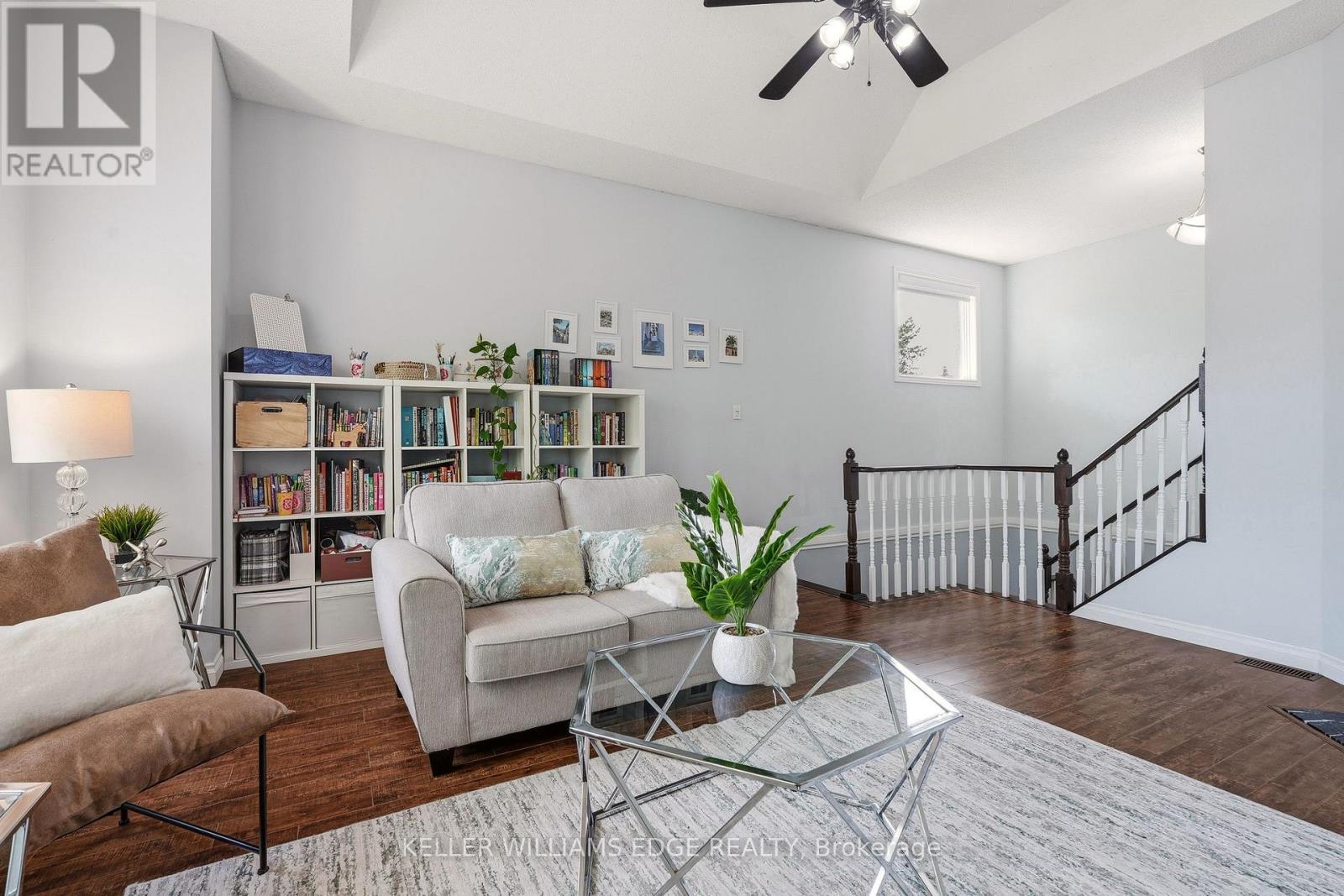 Bright 2nd-floor den w/ fireplace & large windows - 149 Cove Crescent, Hamilton, ON - Indoor Photo Showing Living Room