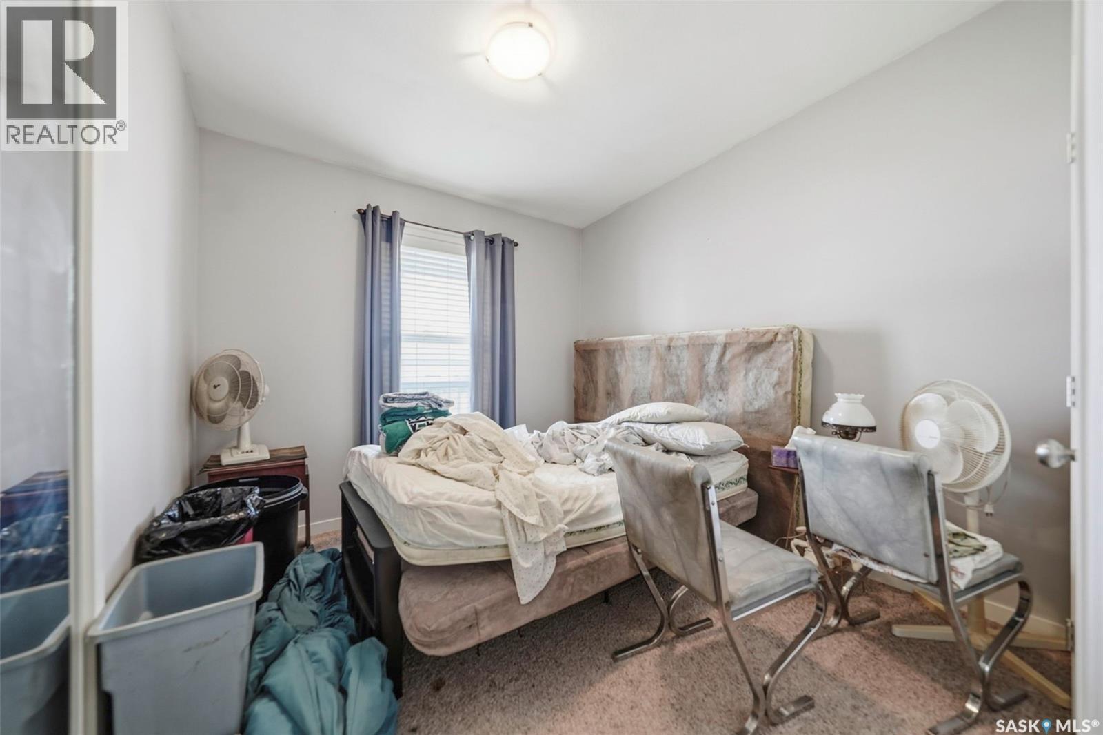 409 8Th Avenue W, Watrous, SK - Indoor Photo Showing Bedroom