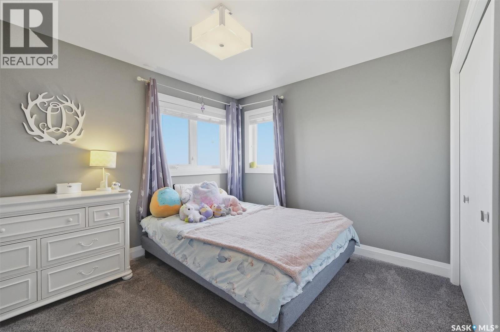 719 Salloum Crescent, Saskatoon, SK - Indoor Photo Showing Bedroom