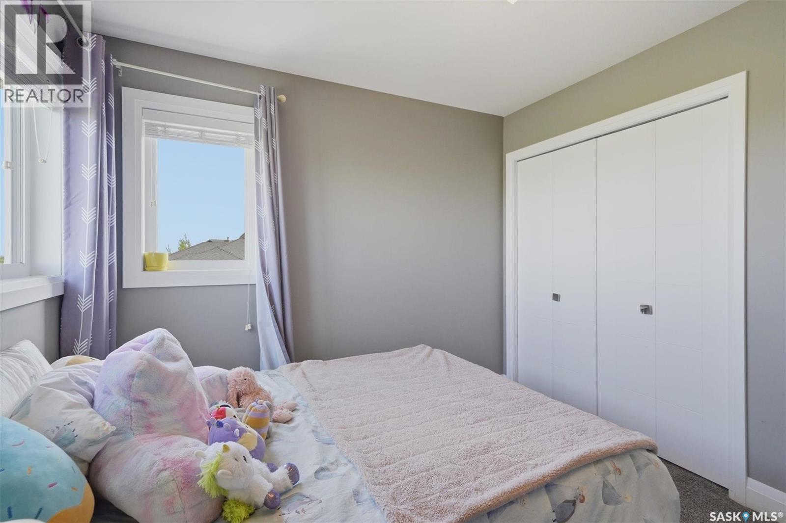 719 Salloum Crescent, Saskatoon, SK - Indoor Photo Showing Bedroom