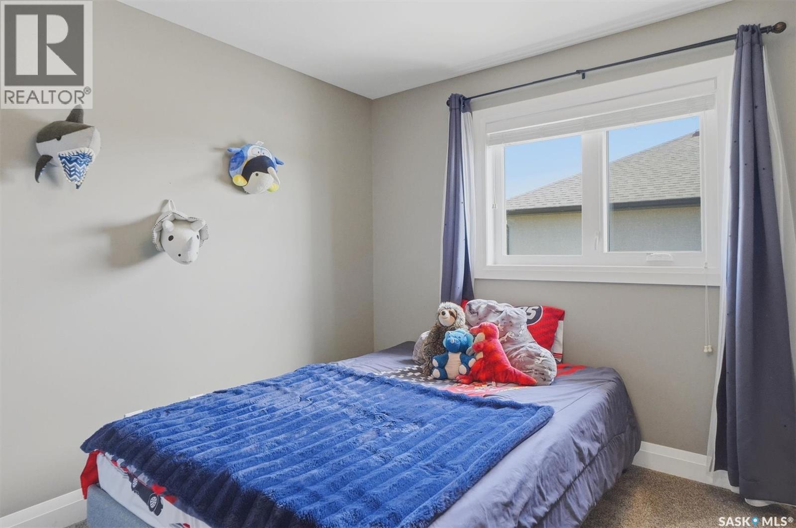 719 Salloum Crescent, Saskatoon, SK - Indoor Photo Showing Bedroom