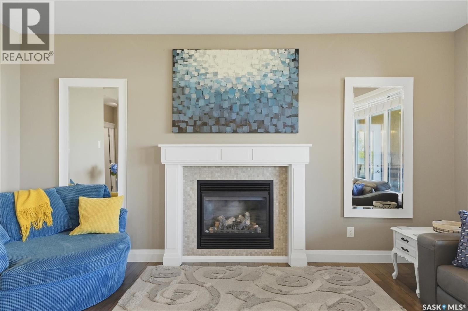719 Salloum Crescent, Saskatoon, SK - Indoor Photo Showing Living Room With Fireplace