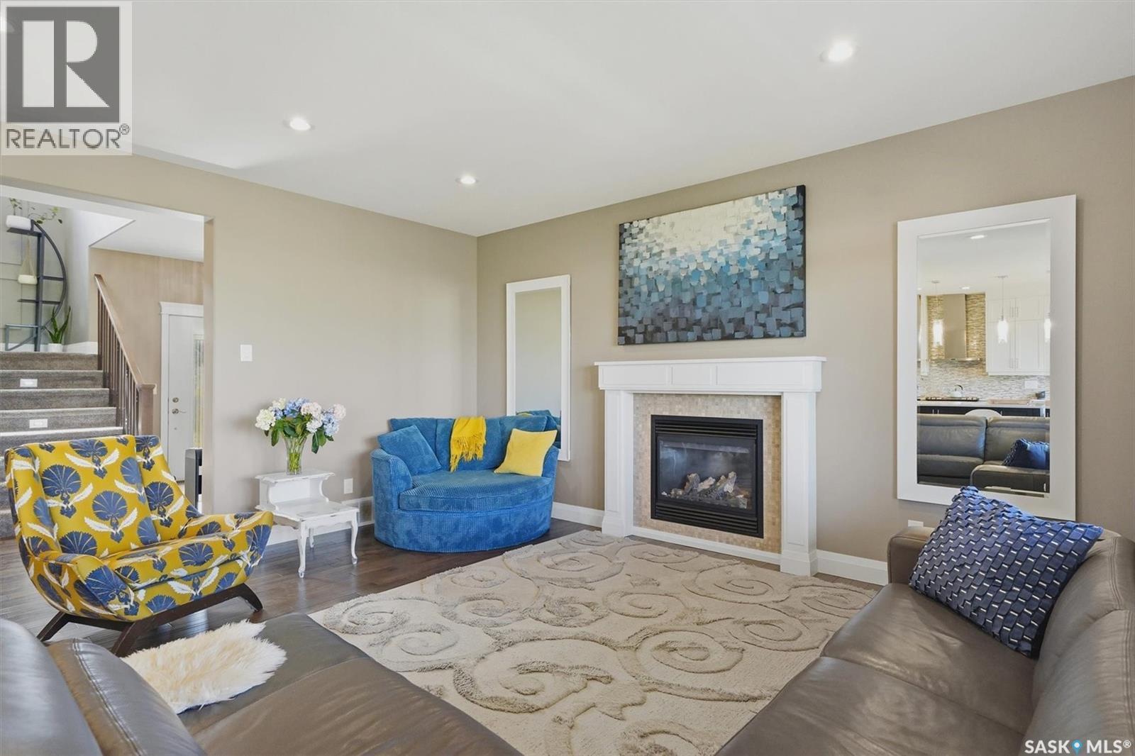 719 Salloum Crescent, Saskatoon, SK - Indoor Photo Showing Living Room With Fireplace