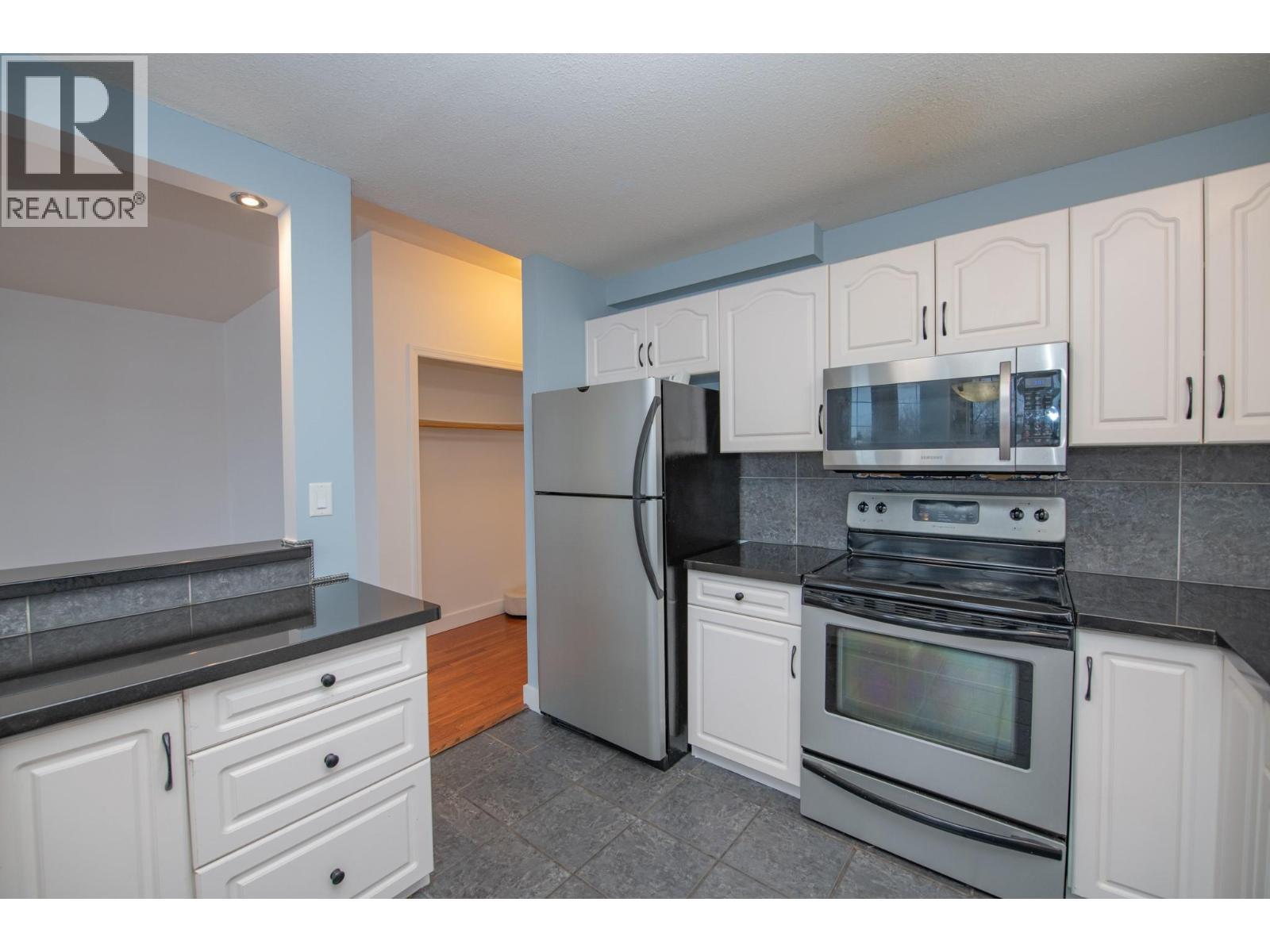3414A 28Th Avenue Unit# 2, Vernon, BC - Indoor Photo Showing Kitchen With Stainless Steel Kitchen