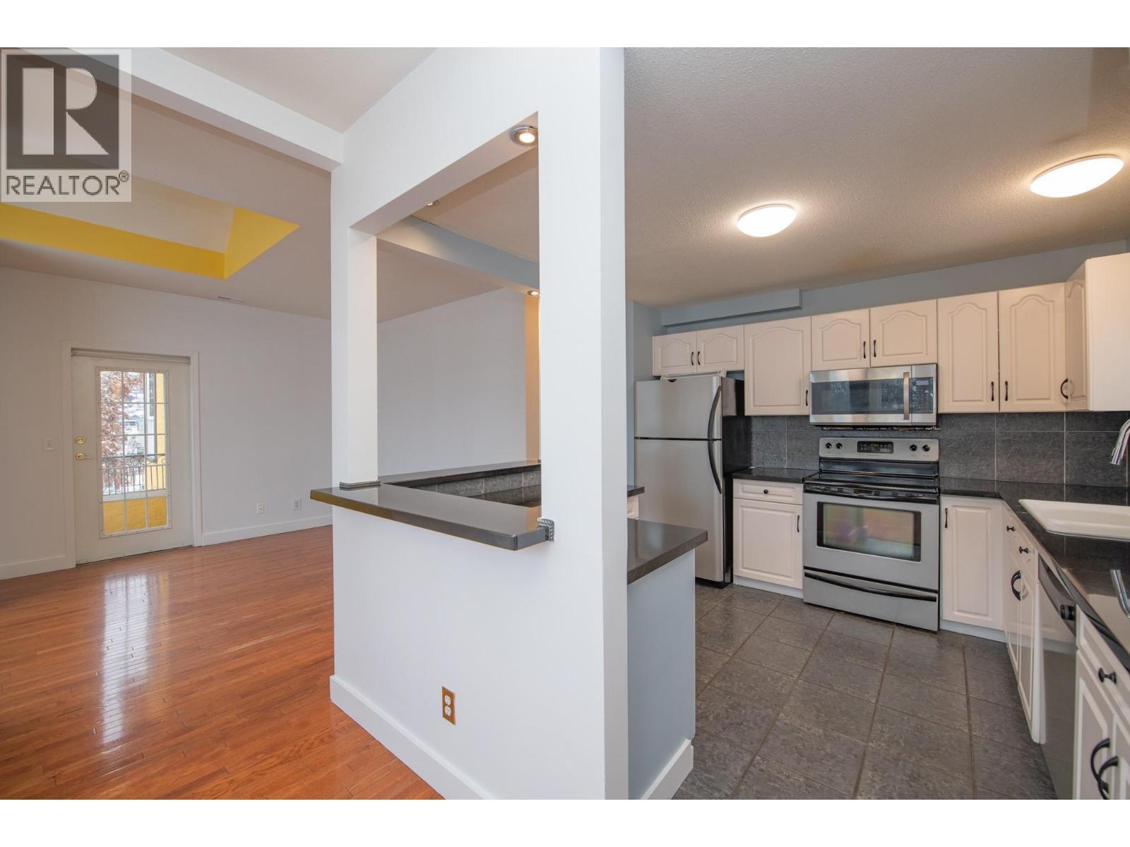 3414A 28Th Avenue Unit# 2, Vernon, BC - Indoor Photo Showing Kitchen With Double Sink