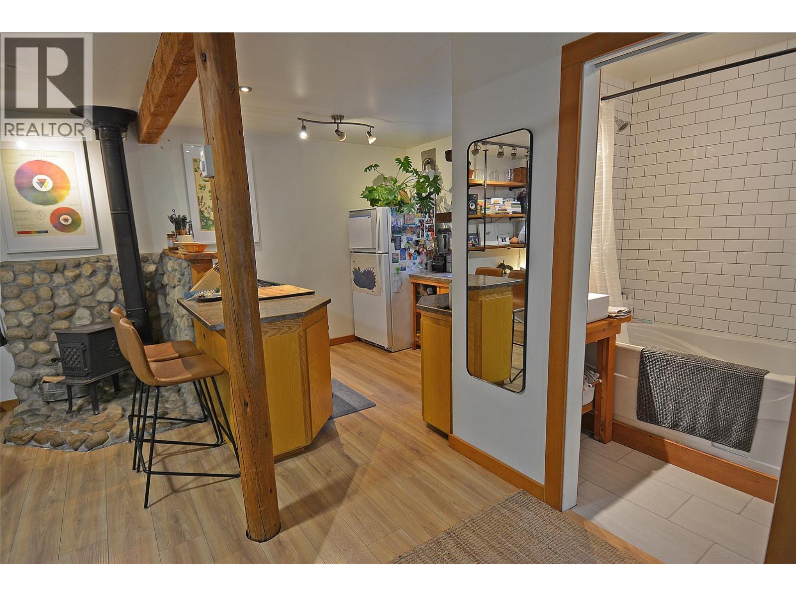 5396 6 Highway, Winlaw, BC - Indoor Photo Showing Other Room With Fireplace