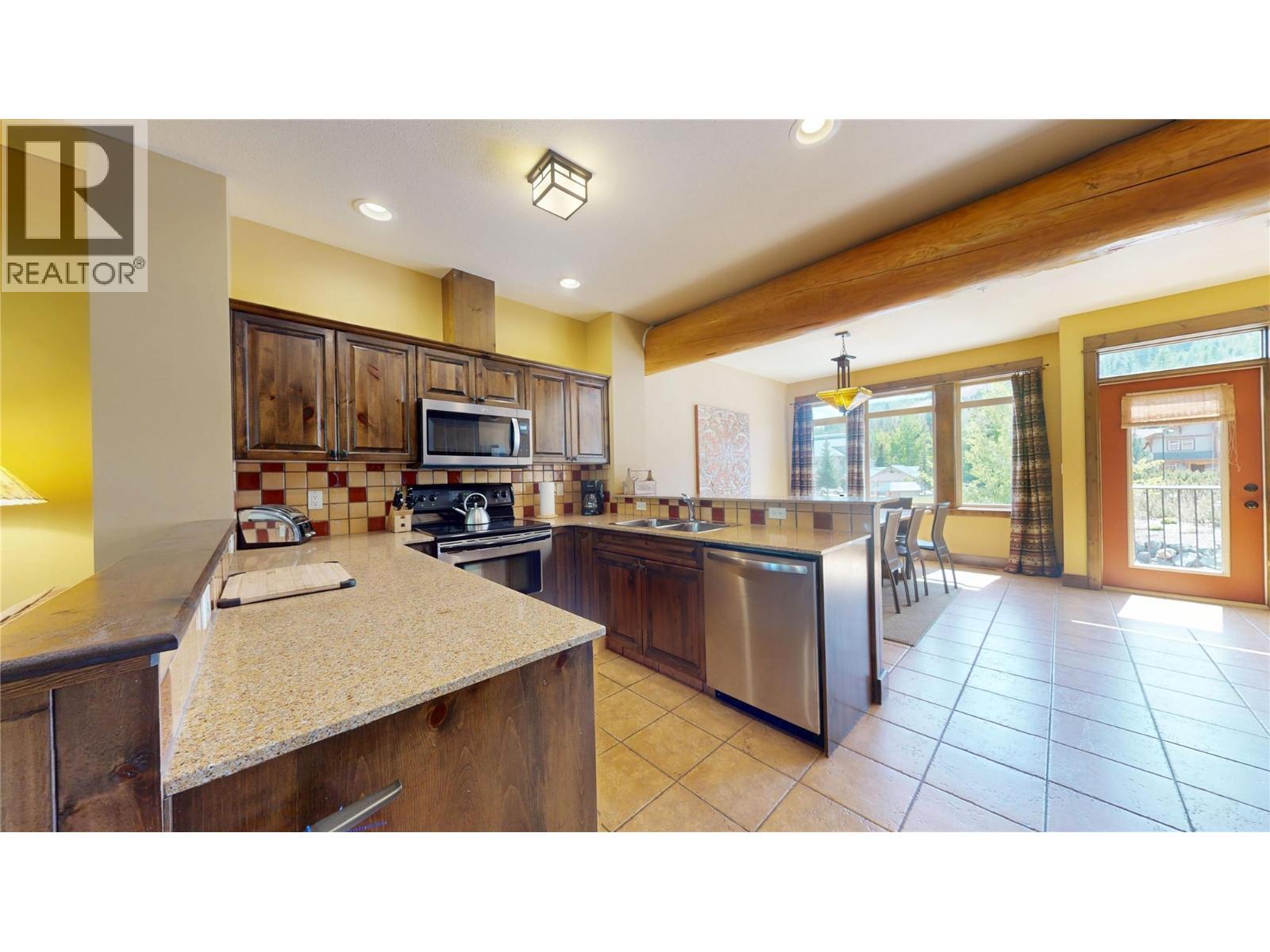1351 Gerry Sorensen Way Unit# J2-B, Kimberley, BC - Indoor Photo Showing Kitchen With Double Sink
