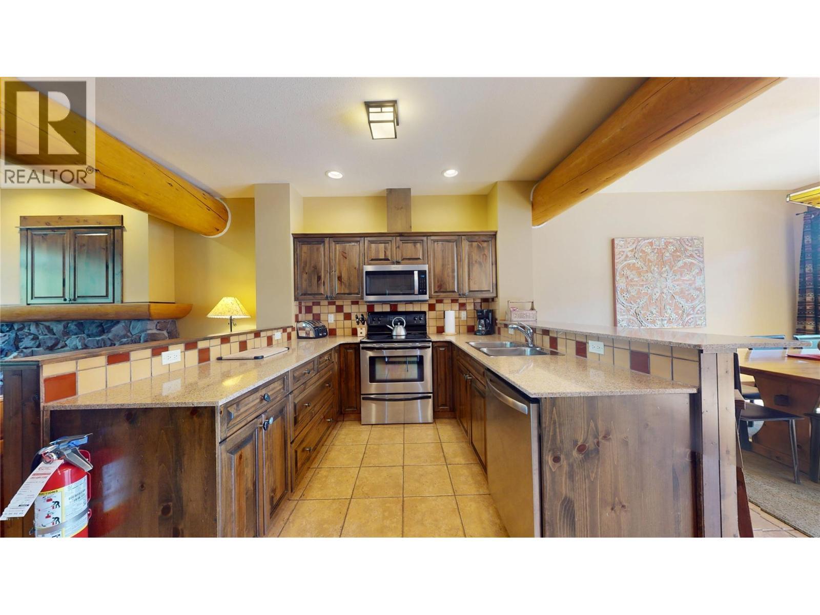 1351 Gerry Sorensen Way Unit# J2-B, Kimberley, BC - Indoor Photo Showing Kitchen With Double Sink