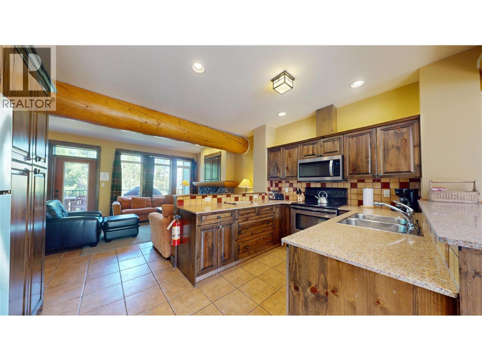 1351 Gerry Sorensen Way Unit# J2-B, Kimberley, BC - Indoor Photo Showing Kitchen With Double Sink