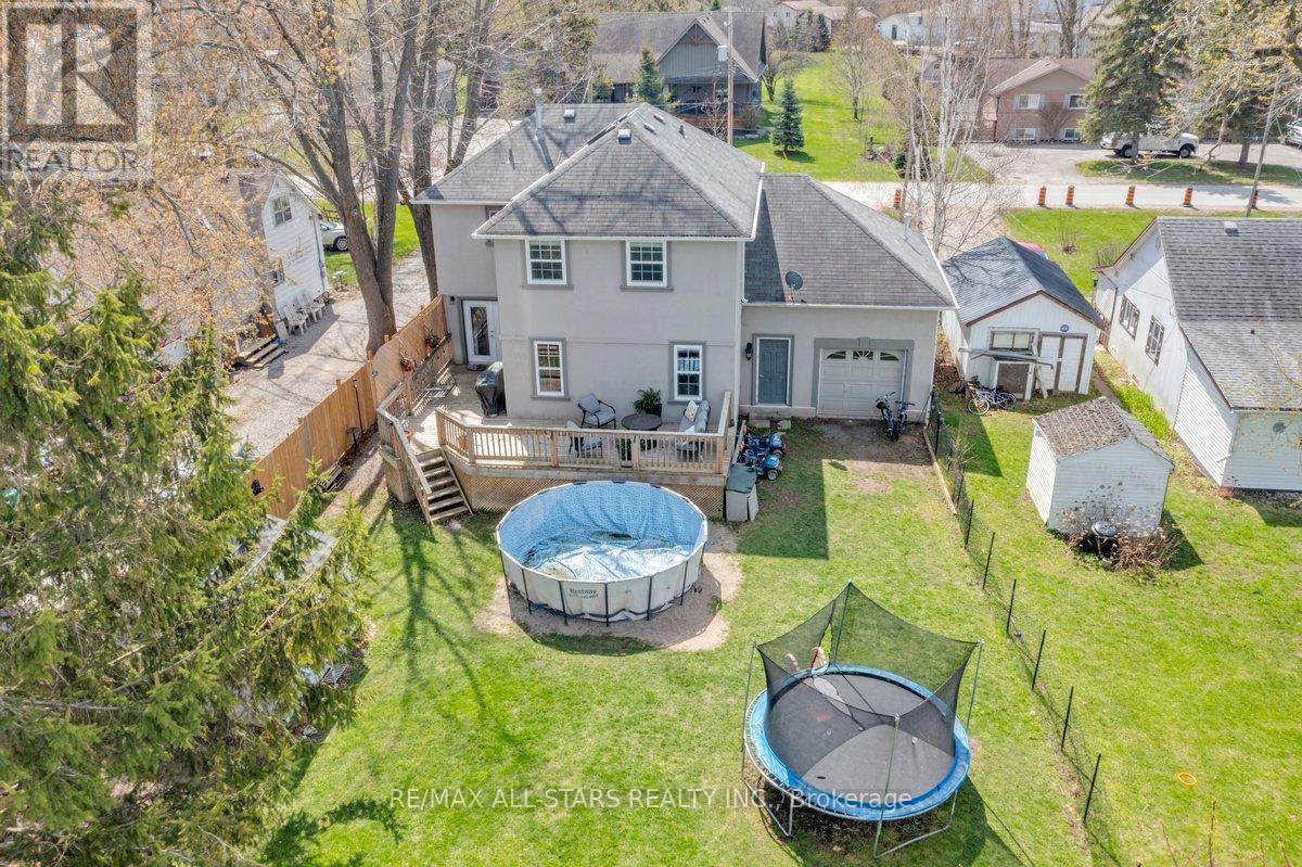 420 Centre Street, Brock, ON - Outdoor With Above Ground Pool With View