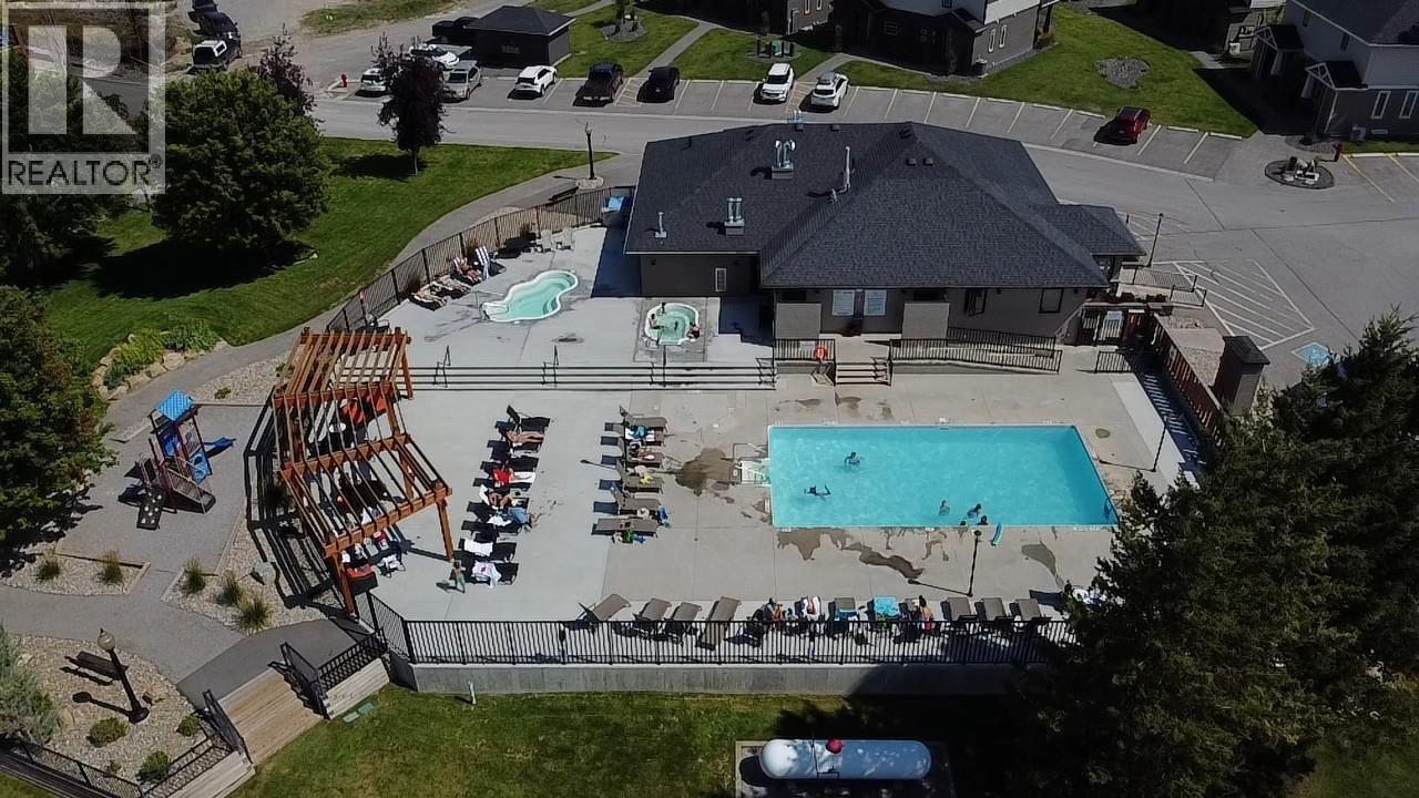 400 Bighorn Boulevard Unit# 416 K1, Radium Hot Springs, BC - Outdoor With In Ground Pool With View