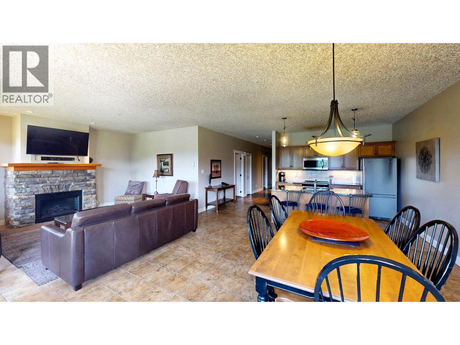 400 Bighorn Boulevard Unit# 416 K1, Radium Hot Springs, BC - Indoor With Fireplace