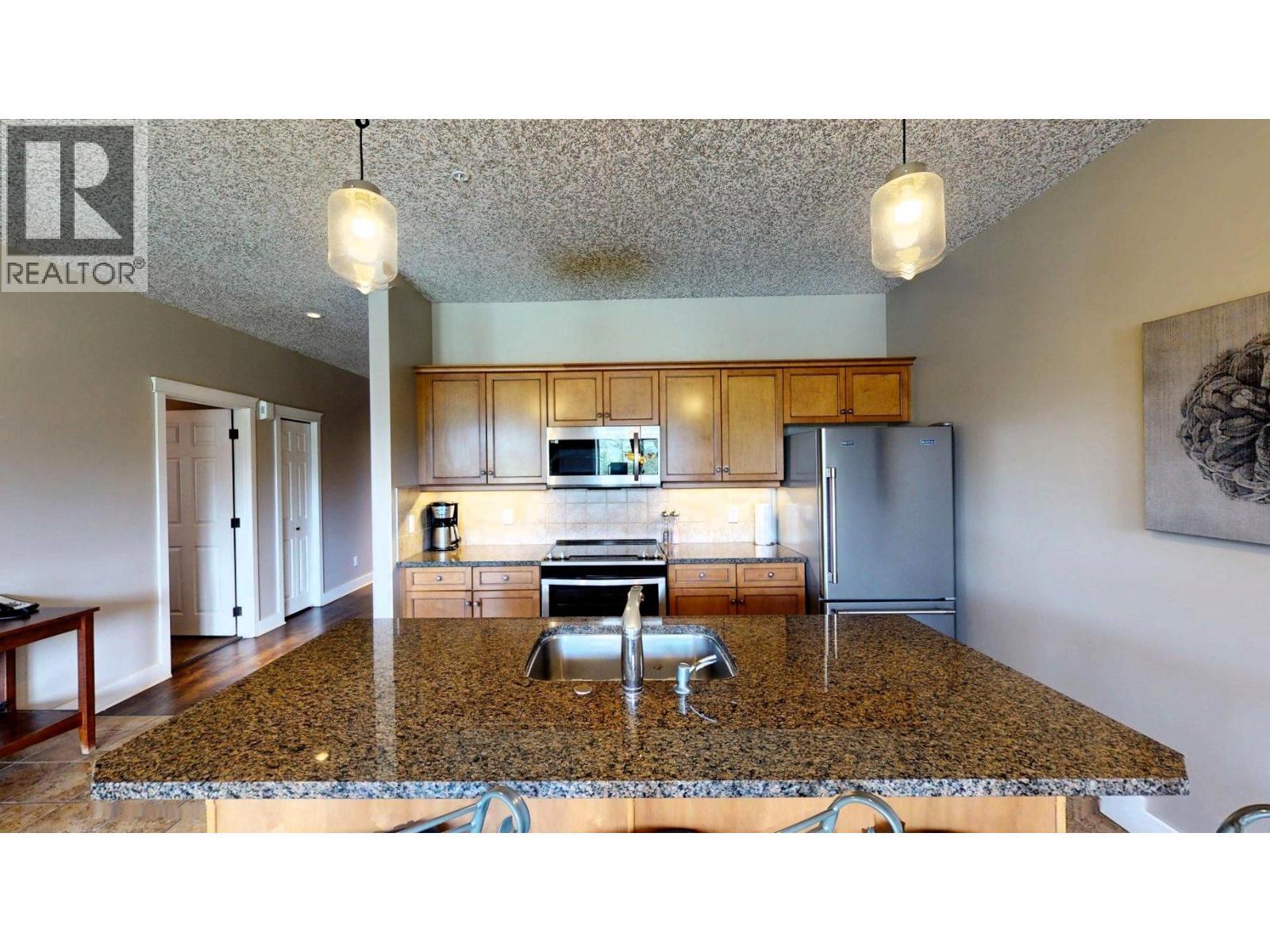400 Bighorn Boulevard Unit# 416 K1, Radium Hot Springs, BC - Indoor Photo Showing Kitchen With Double Sink