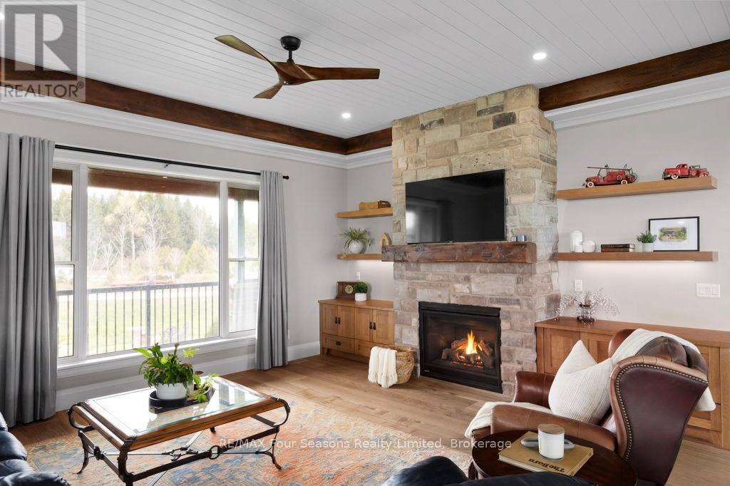 8672 County Rd 91 Road, Clearview, ON - Indoor Photo Showing Living Room With Fireplace