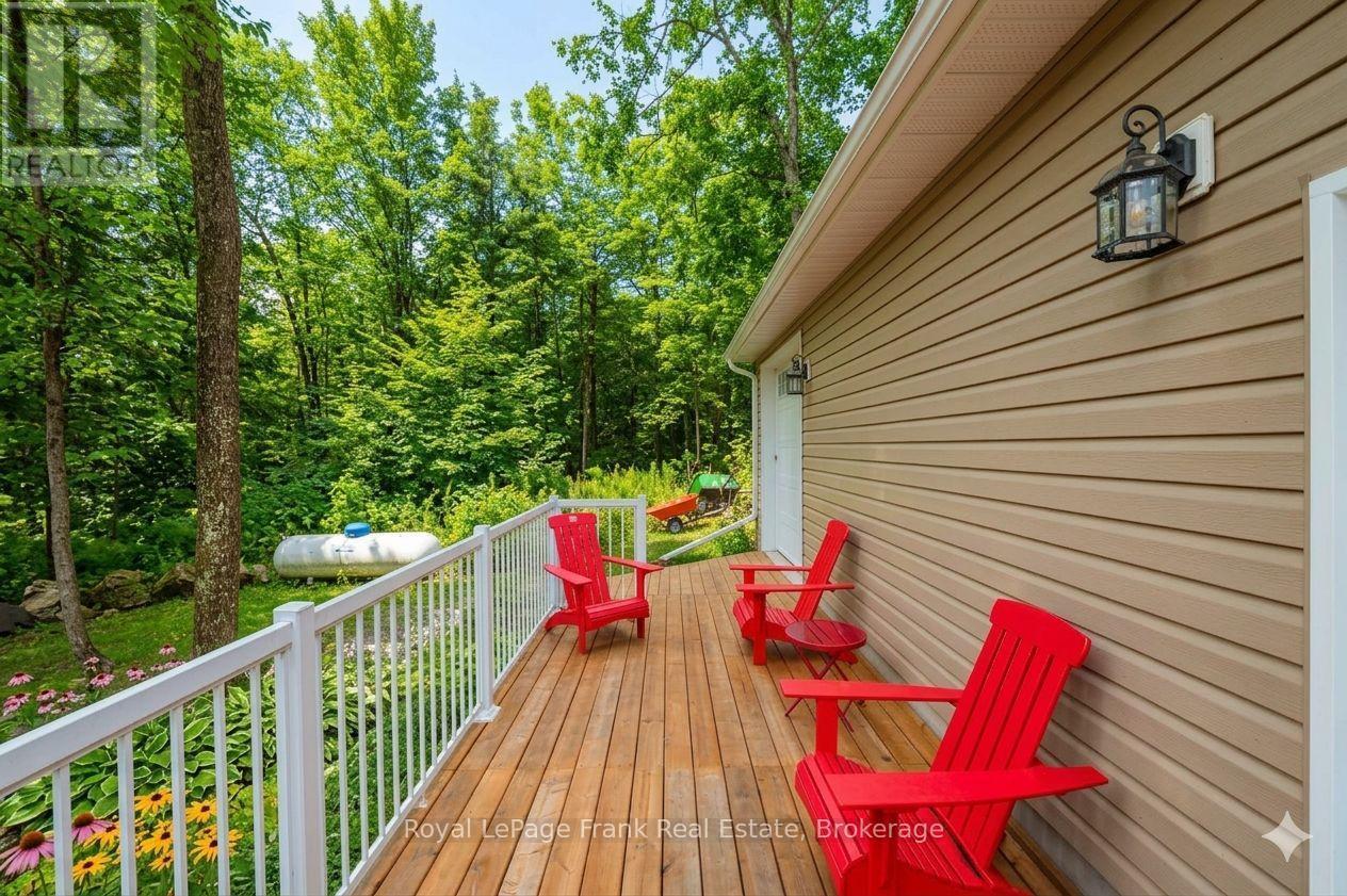 AI Generated - 25 Lakeland Avenue, Trent Lakes, ON - Outdoor With Deck Patio Veranda With Exterior