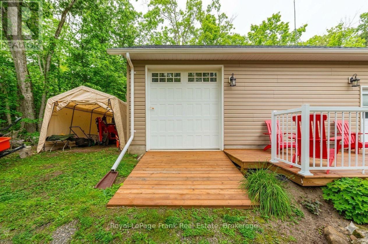 AI Generated - 25 Lakeland Avenue, Trent Lakes, ON - Outdoor With Deck Patio Veranda With Exterior