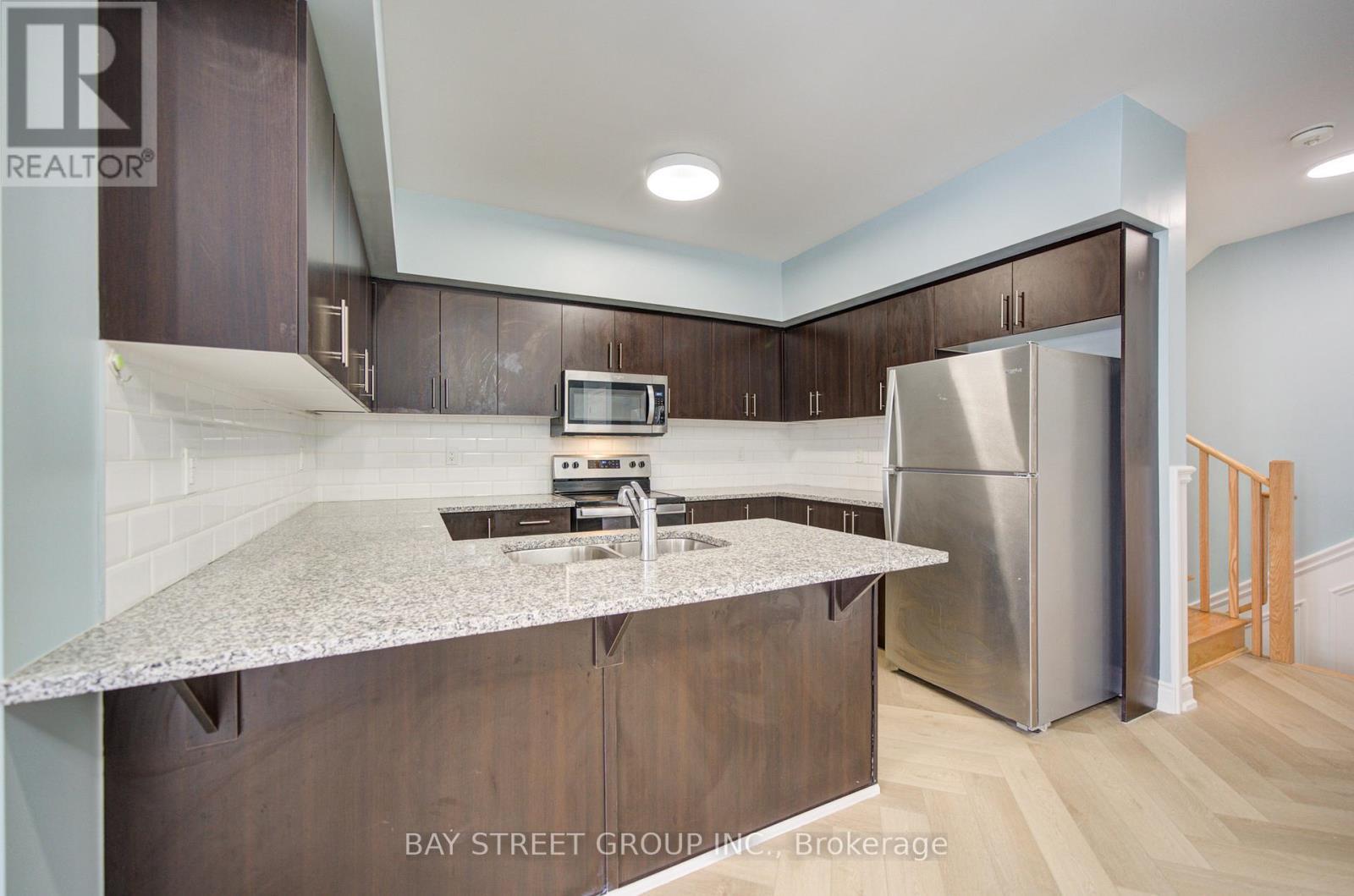 kitch - 3 - 626 Rexdale Boulevard, Toronto, ON - Indoor Photo Showing Kitchen With Stainless Steel Kitchen With Double Sink
