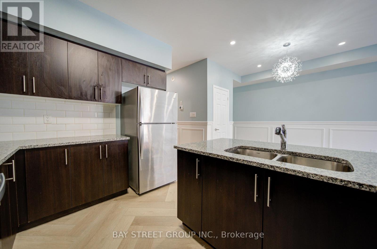 3 - 626 Rexdale Boulevard, Toronto, ON - Indoor Photo Showing Kitchen With Stainless Steel Kitchen With Double Sink With Upgraded Kitchen