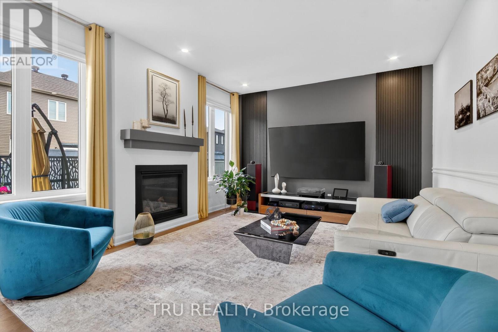 202 Skipper Drive, Ottawa, ON - Indoor Photo Showing Living Room With Fireplace
