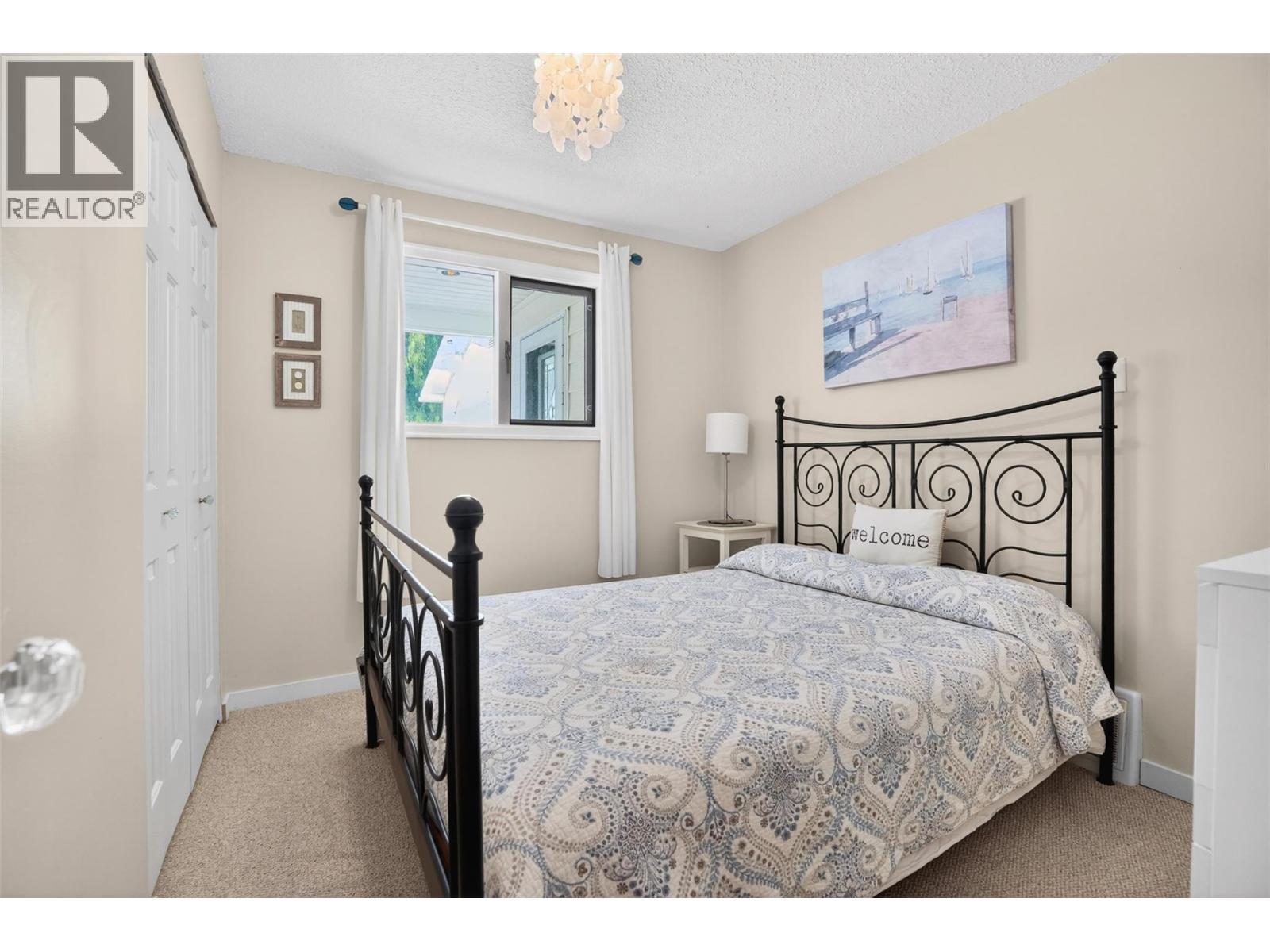 8110 & 8120 Busk Road, Balfour, BC - Indoor Photo Showing Bedroom