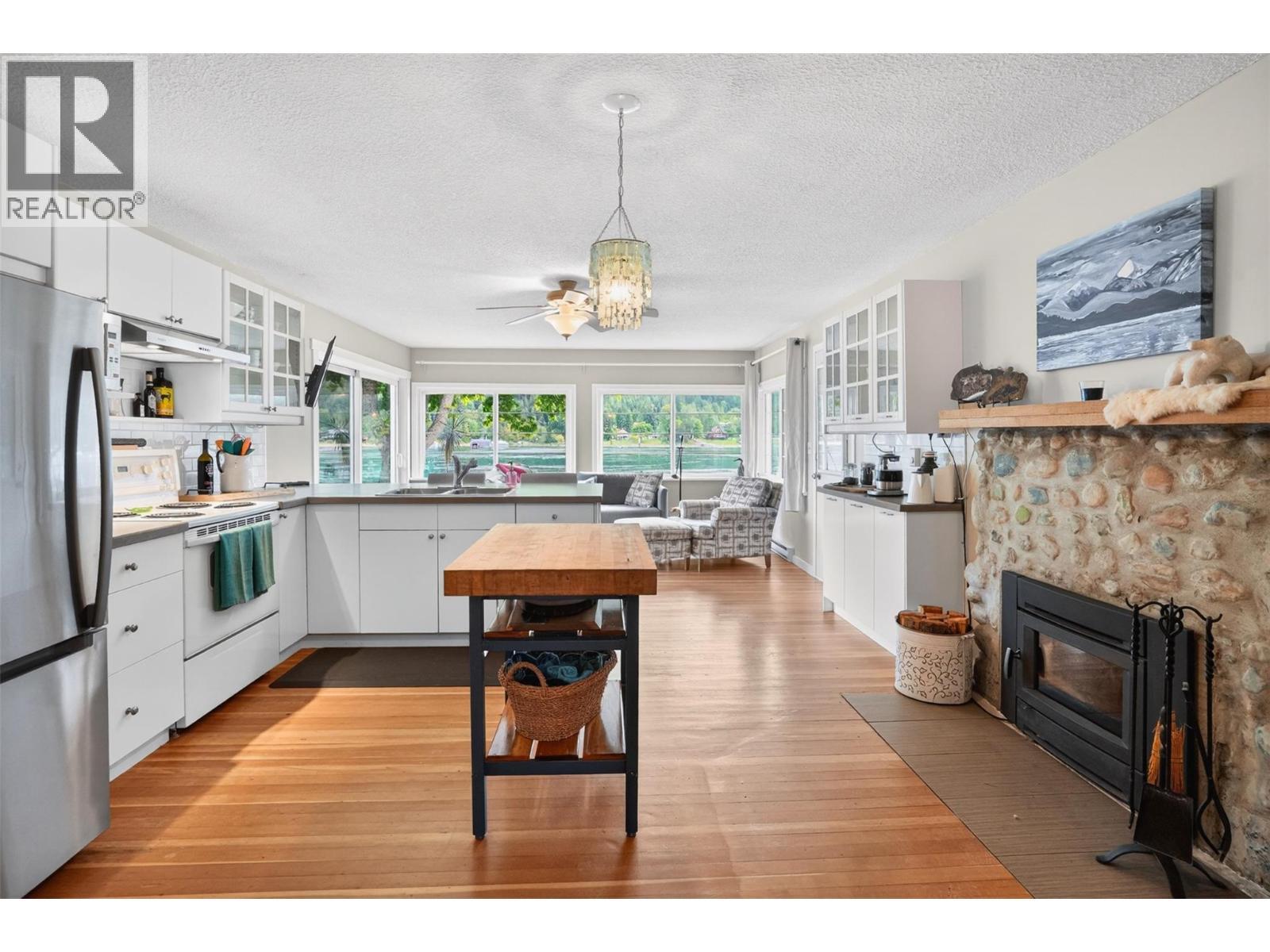 8110 & 8120 Busk Road, Balfour, BC - Indoor With Fireplace