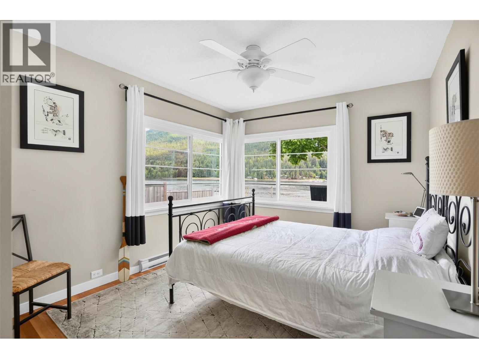8110 & 8120 Busk Road, Balfour, BC - Indoor Photo Showing Bedroom