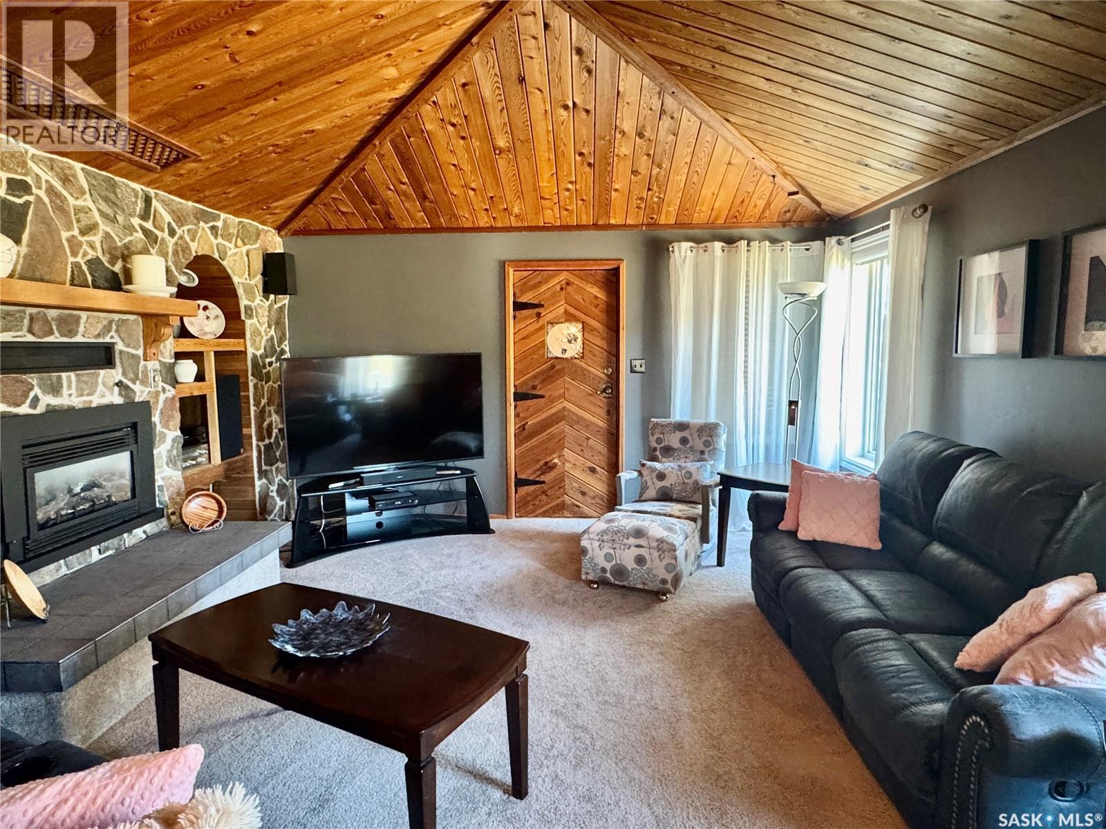 1632 Studer Street, La Ronge, SK - Indoor Photo Showing Living Room With Fireplace