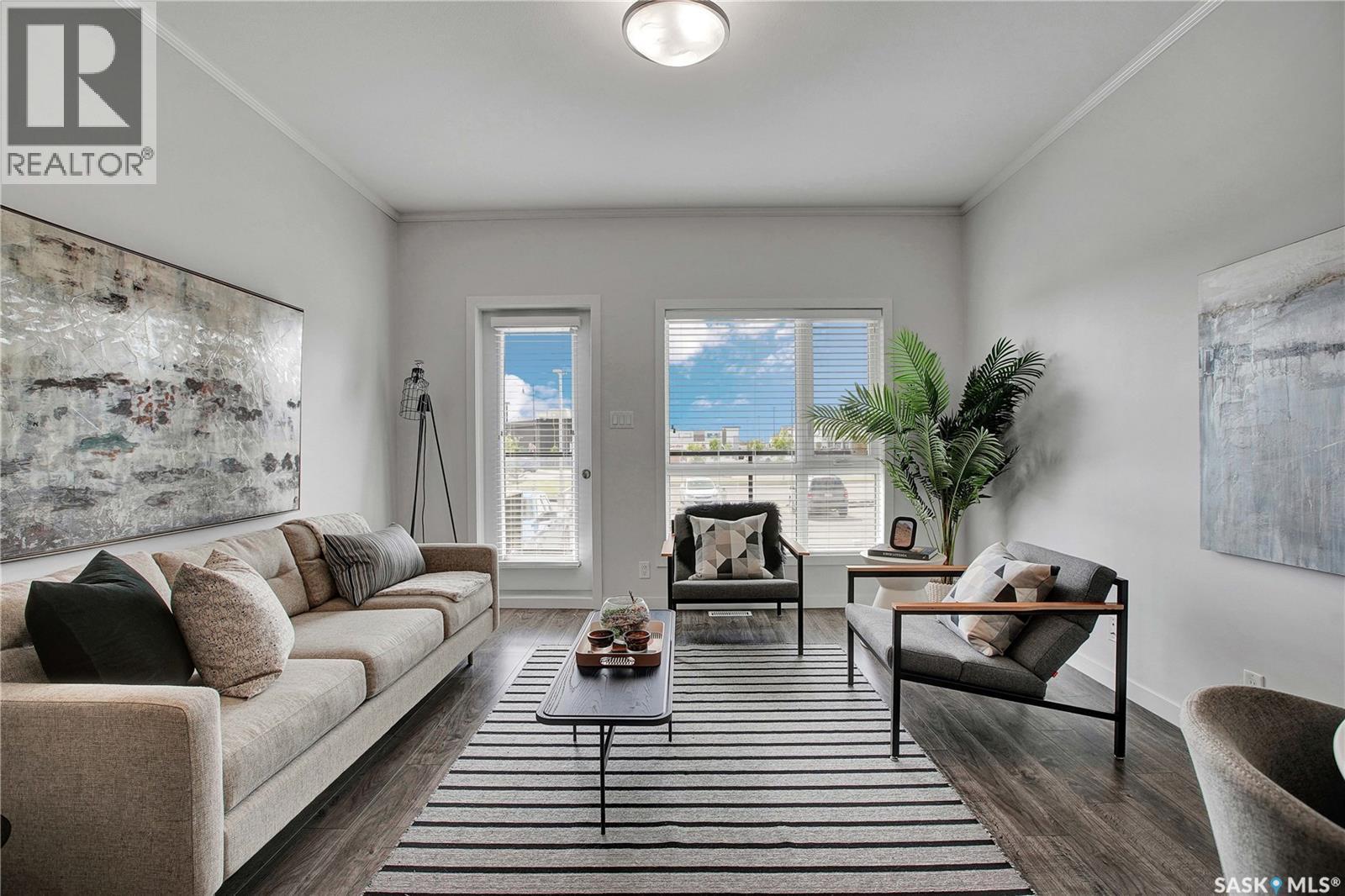 106 545 Hassard Close, Saskatoon, SK - Indoor Photo Showing Living Room