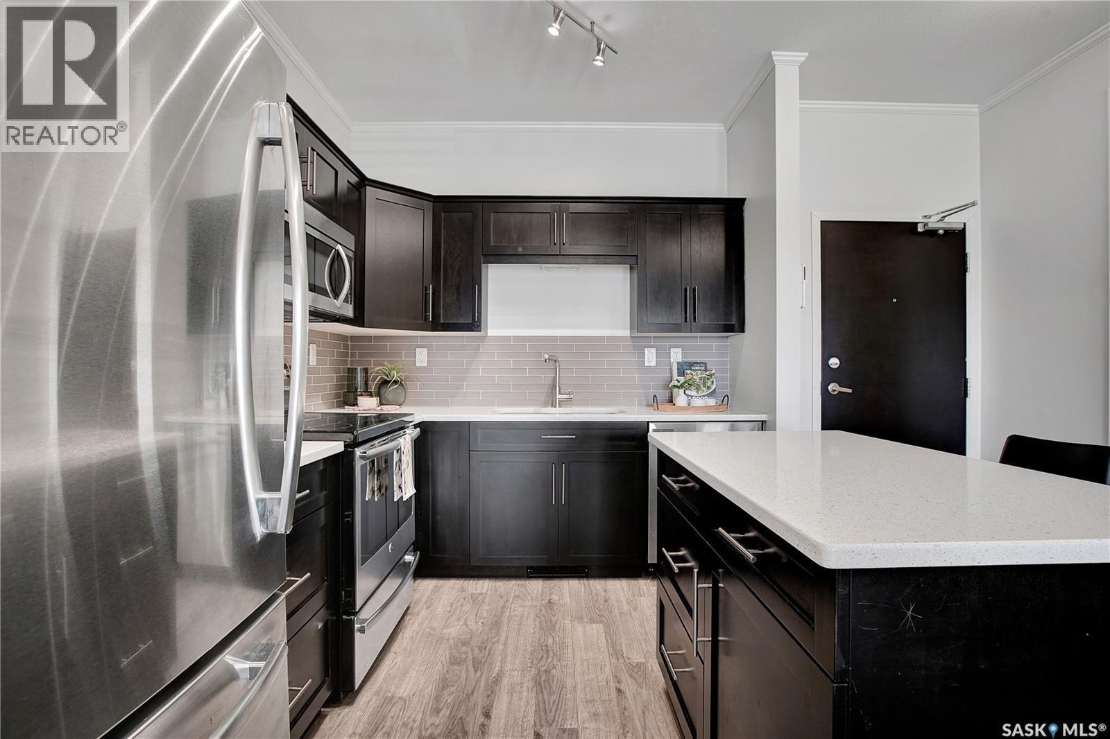 106 545 Hassard Close, Saskatoon, SK - Indoor Photo Showing Kitchen With Stainless Steel Kitchen With Upgraded Kitchen