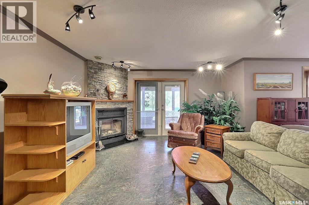 Mcouatt Acreage, Lumsden Rm No. 189, SK - Indoor Photo Showing Living Room With Fireplace