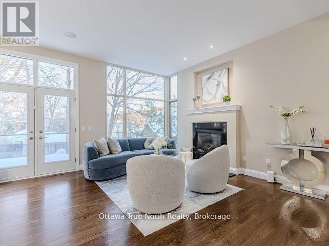 105 Black Maple Private, Ottawa, ON - Indoor Photo Showing Living Room With Fireplace