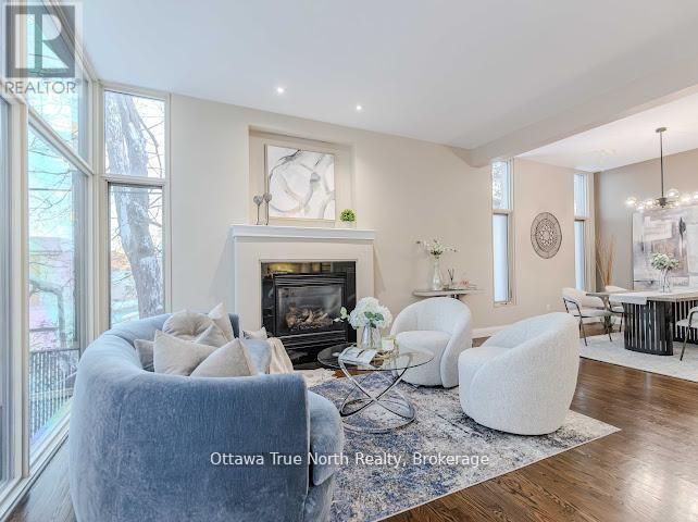 105 Black Maple Private, Ottawa, ON - Indoor Photo Showing Living Room With Fireplace