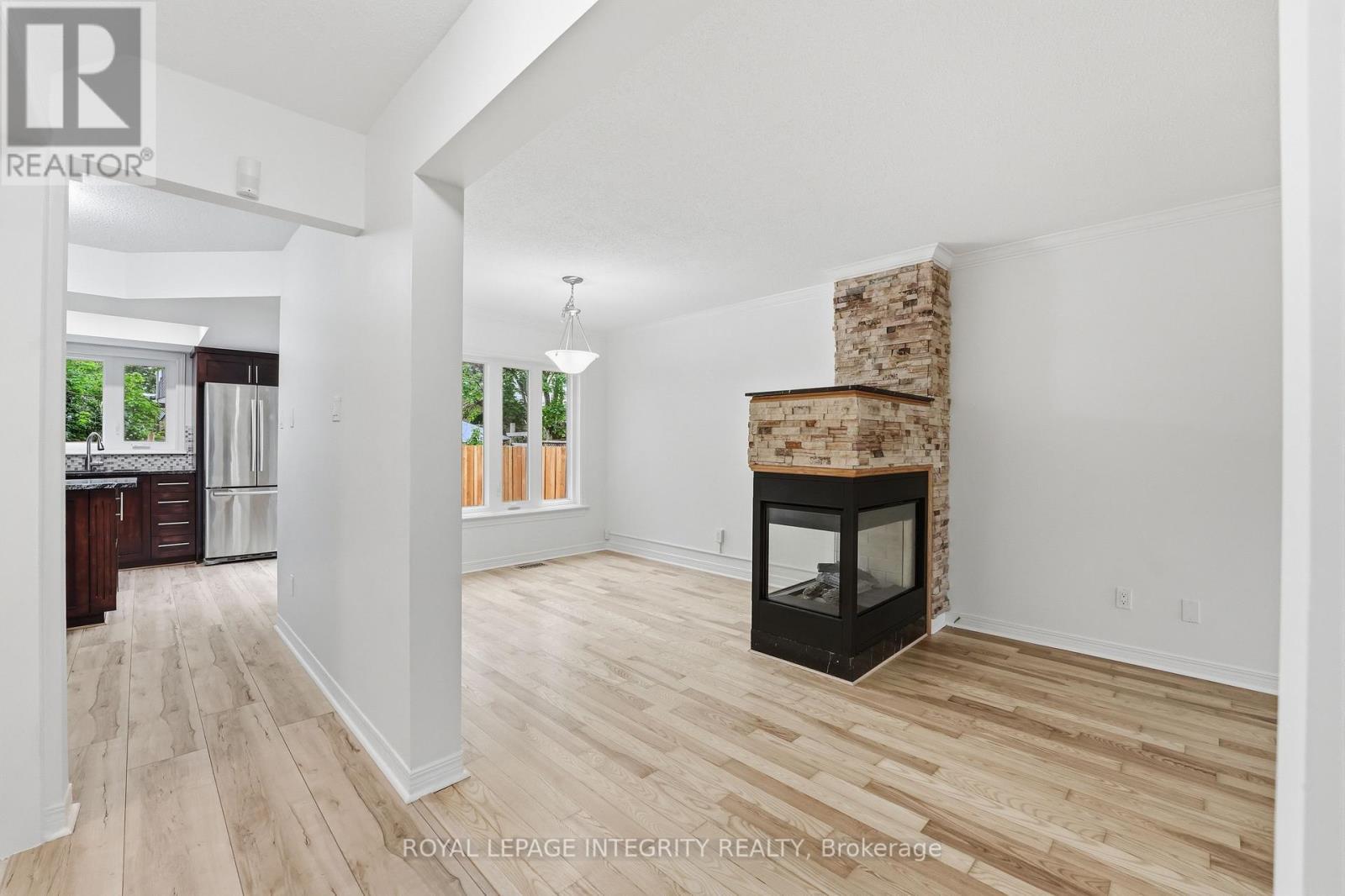 76 Hunterswood Crescent, Ottawa, ON - Indoor Photo Showing Other Room With Fireplace