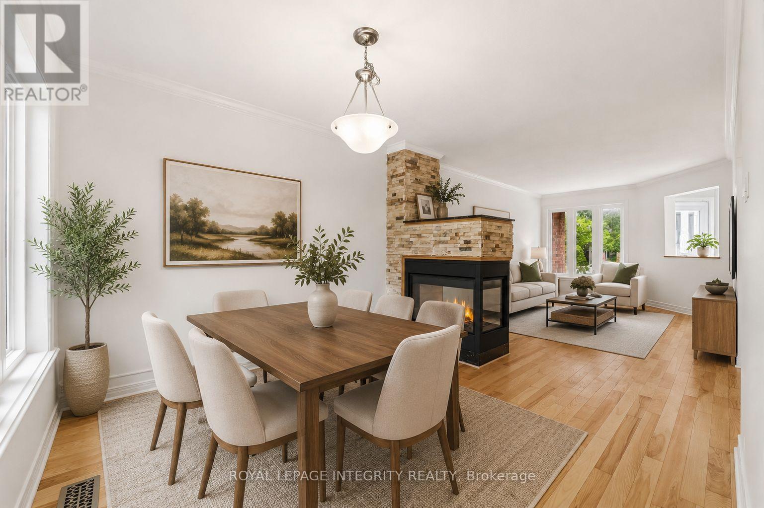 76 Hunterswood Crescent, Ottawa, ON - Indoor Photo Showing Dining Room With Fireplace