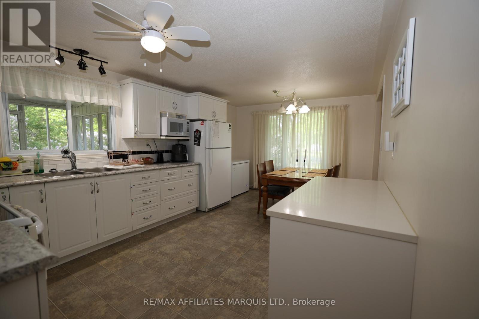 9 Sutton Drive, Edwardsburgh/Cardinal, ON - Indoor Photo Showing Kitchen With Double Sink